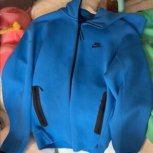 Nike Blue, Green, and White Nike tech. Price for all three